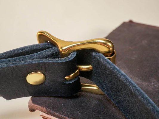 Bound by Dave black leather day collar with gold buckle and rivet detail