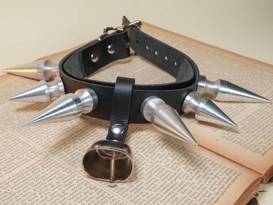 Black leather collar with large metal spikes and a bell, hucow accessory by Bound by Dave