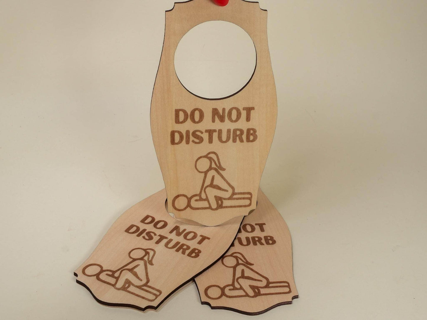 Wooden adult do not disturb sign with engraved text and adult-themed illustration by Bound by Dave
