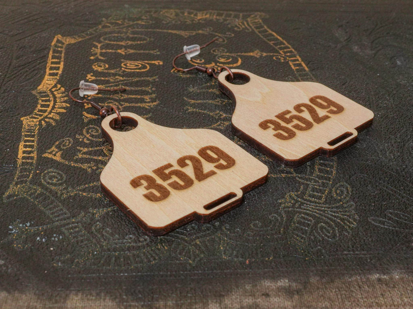 Bound by Dave wooden cow tag earrings with number 3529 engraved for unique rustic style