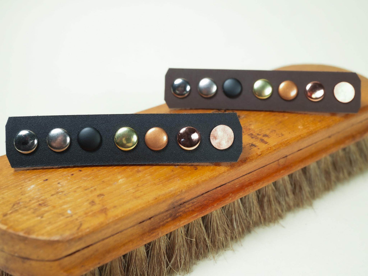 Bound by Dave black leather bracelet featuring multiple metal studs including Heart Lock design