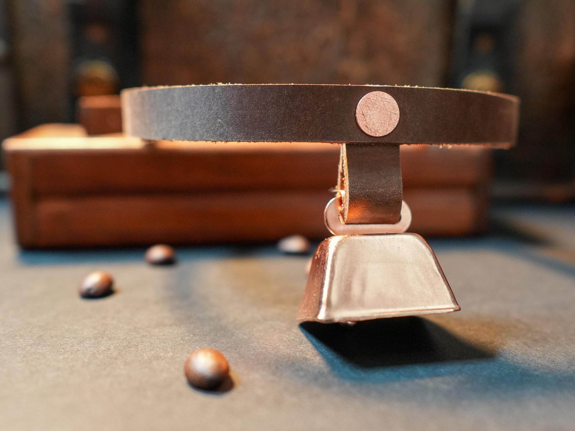 Bound by Dave hucow choker with brown leather strap and metallic cowbell pendant