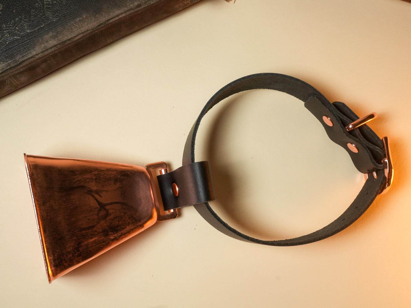 Bound by Dave Hucow Collar featuring black leather strap and copper bell detail