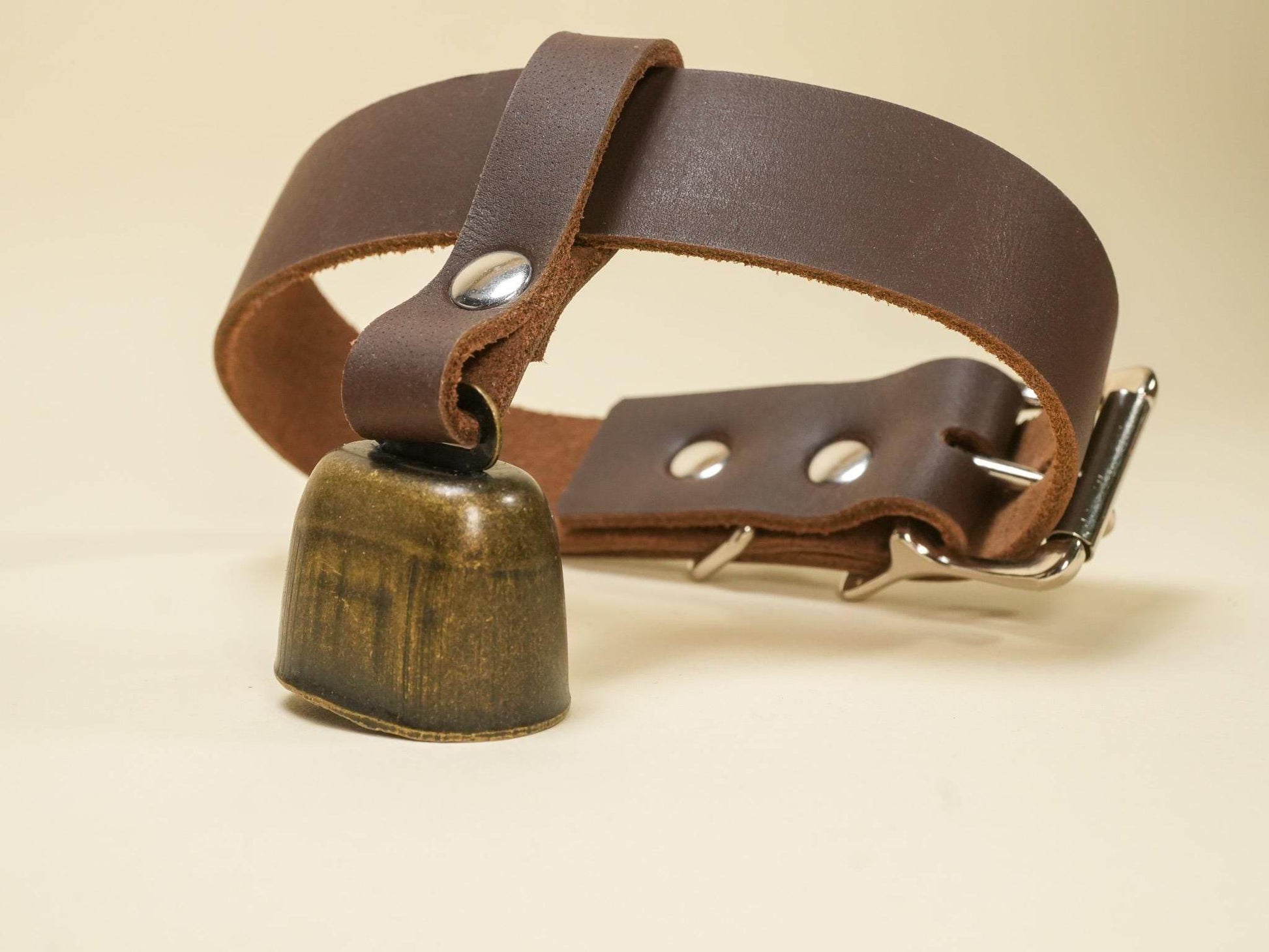 Bound by Dave locking Hucow collar made of brown leather with metal cowbell and buckle