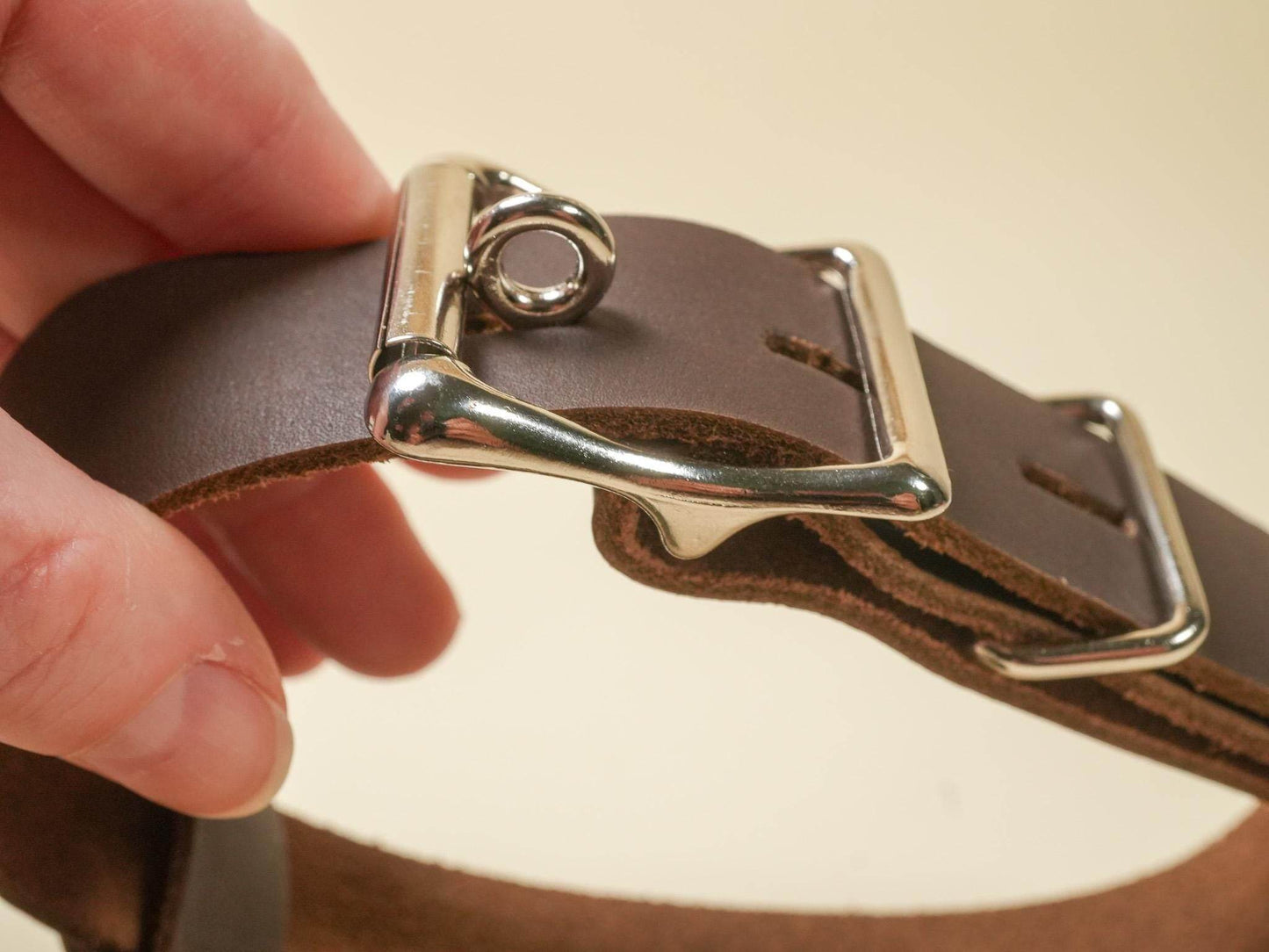 Bound by Dave Locking Hucow Collar close up showing brown leather strap and silver locking buckle