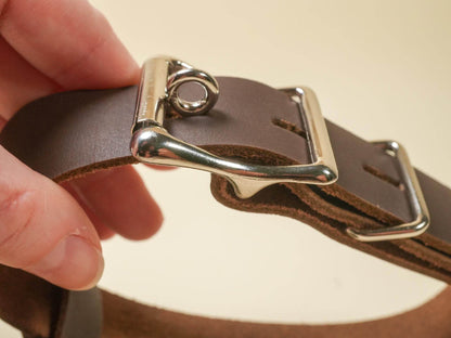 Bound by Dave Locking Hucow Collar close up showing brown leather strap and silver locking buckle