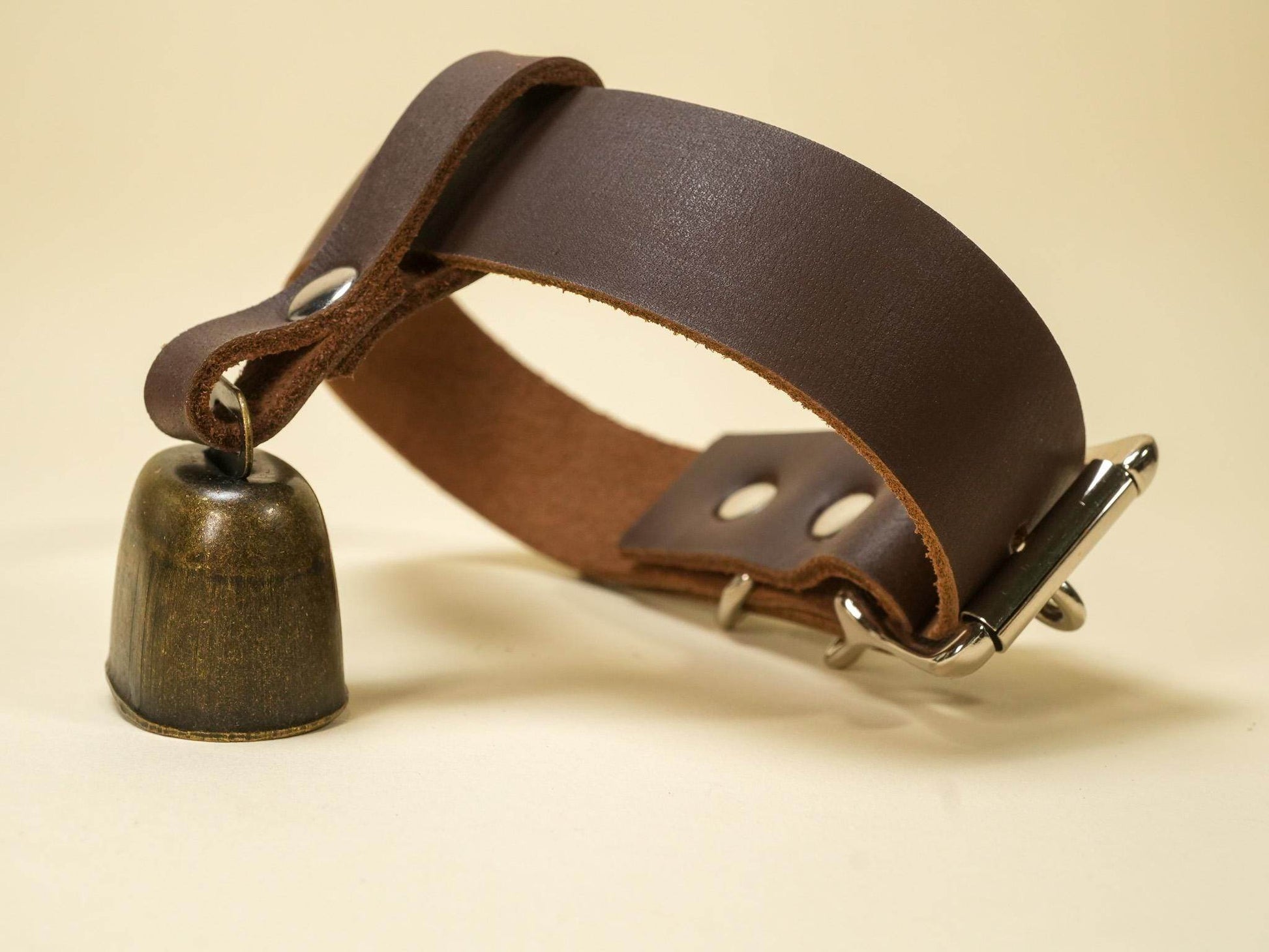 Bound by Dave Locking Hucow Collar in brown leather with metal bell and buckle closure