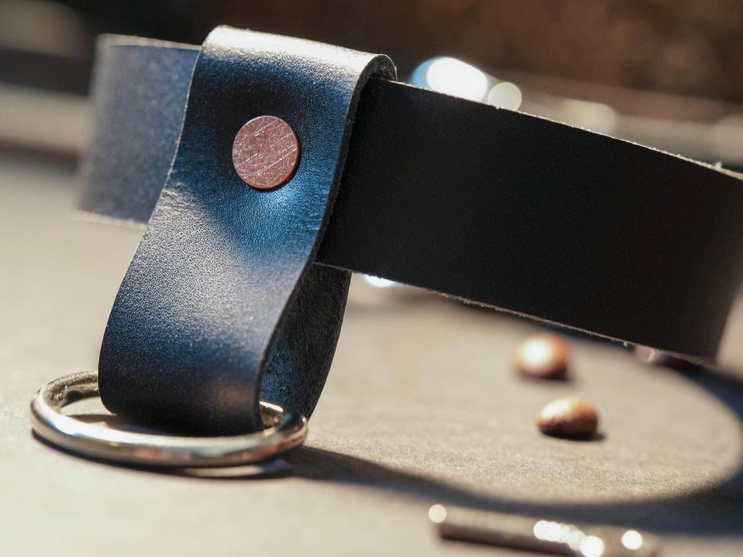 Black leather collar with metal ring featuring a locking sub collar design by Bound by Dave