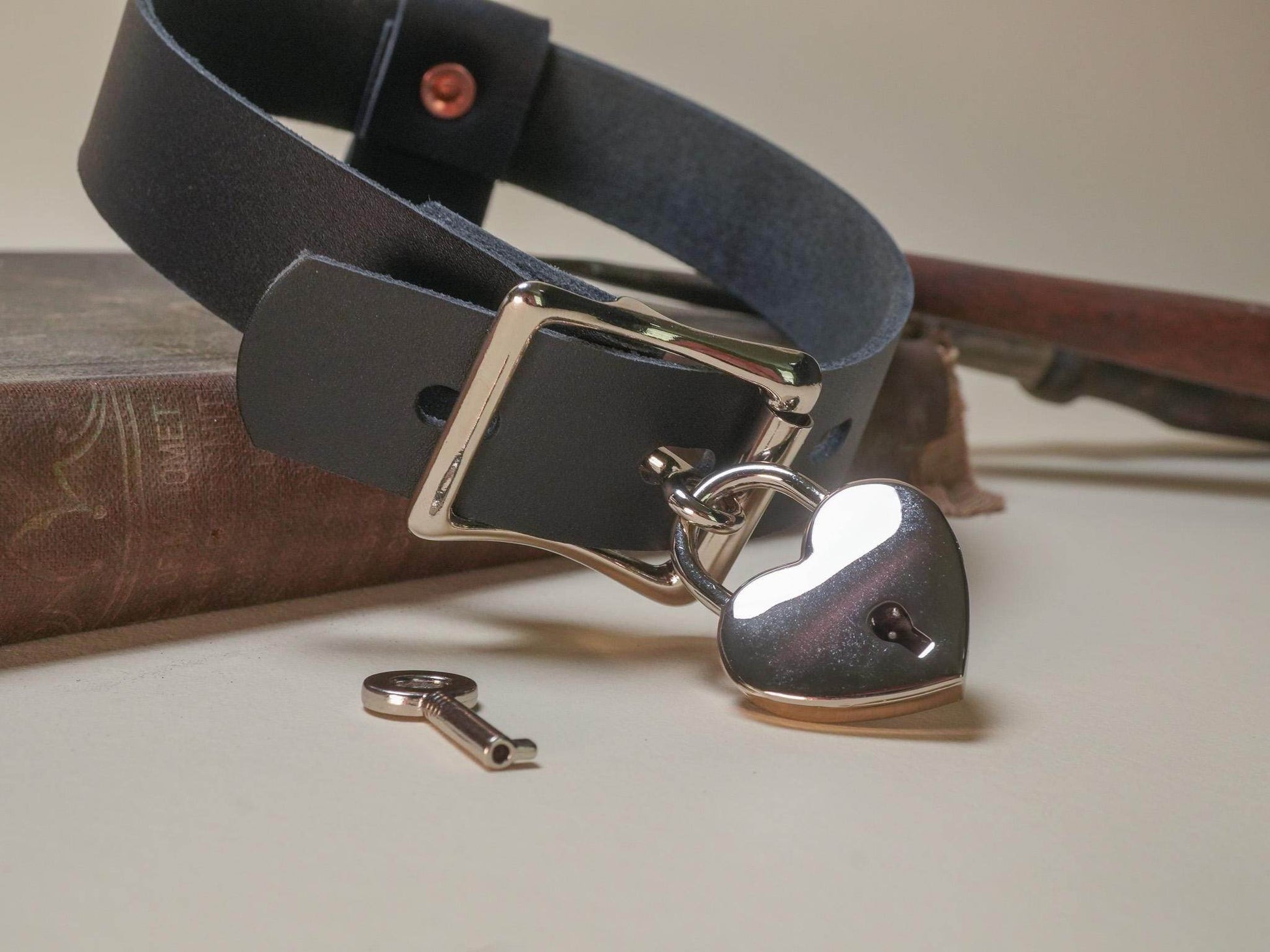 Black leather Locking Sub Collar with heart-shaped padlock and key from Bound by Dave