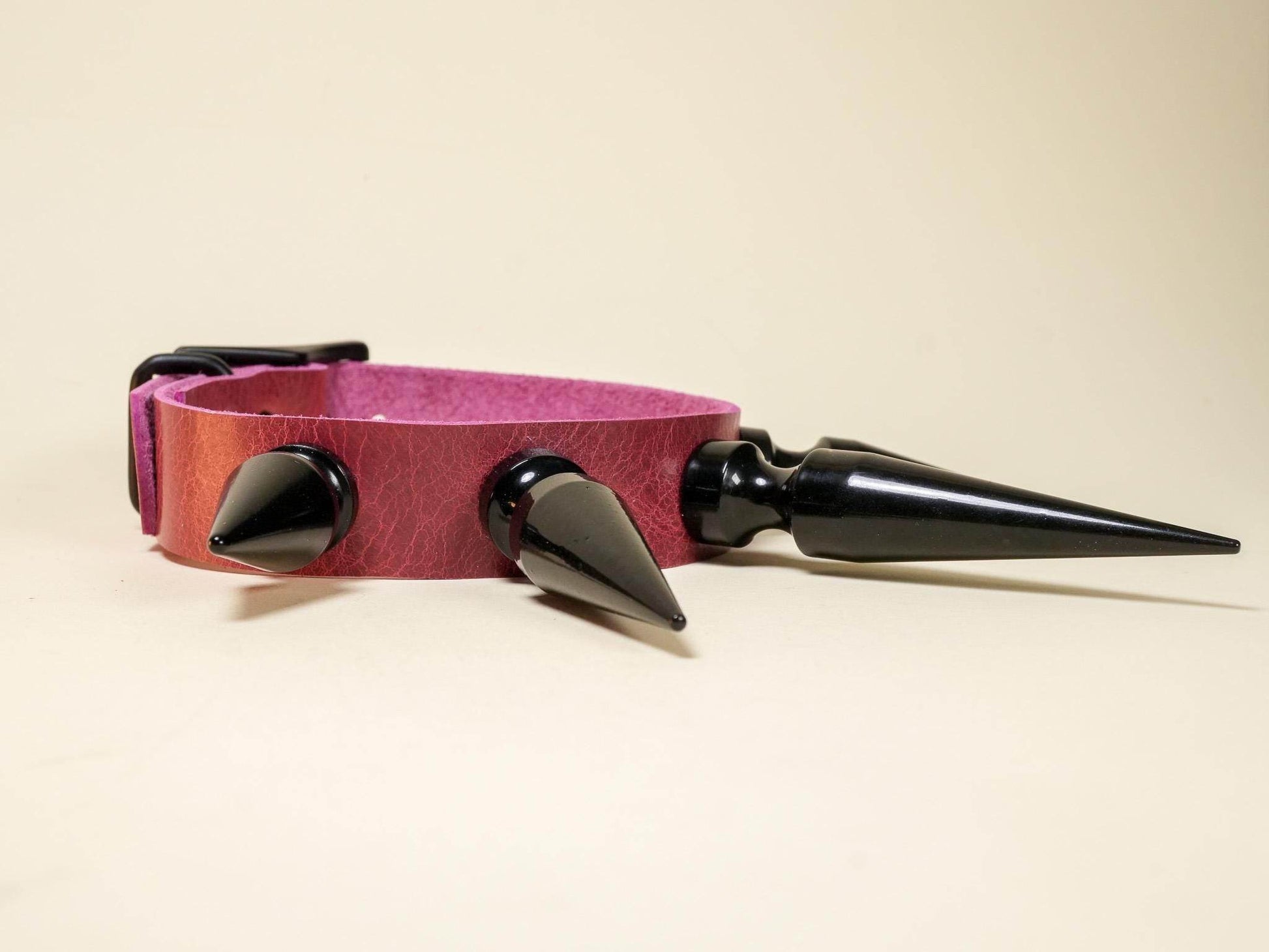 Bound by Dave Rave Choker with black spikes on a pink adjustable strap