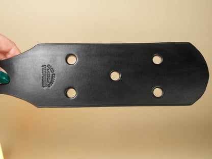 Bound by Dave black leather paddle with five leather paddle holes visible and smooth finish